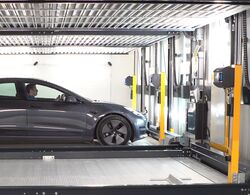 The car is parked on a parking platform