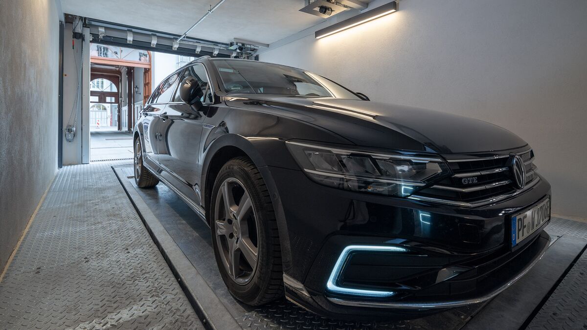 The car is parked on the parking platform in the entrance hall