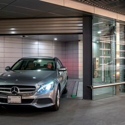 Car driving out of an underground car park