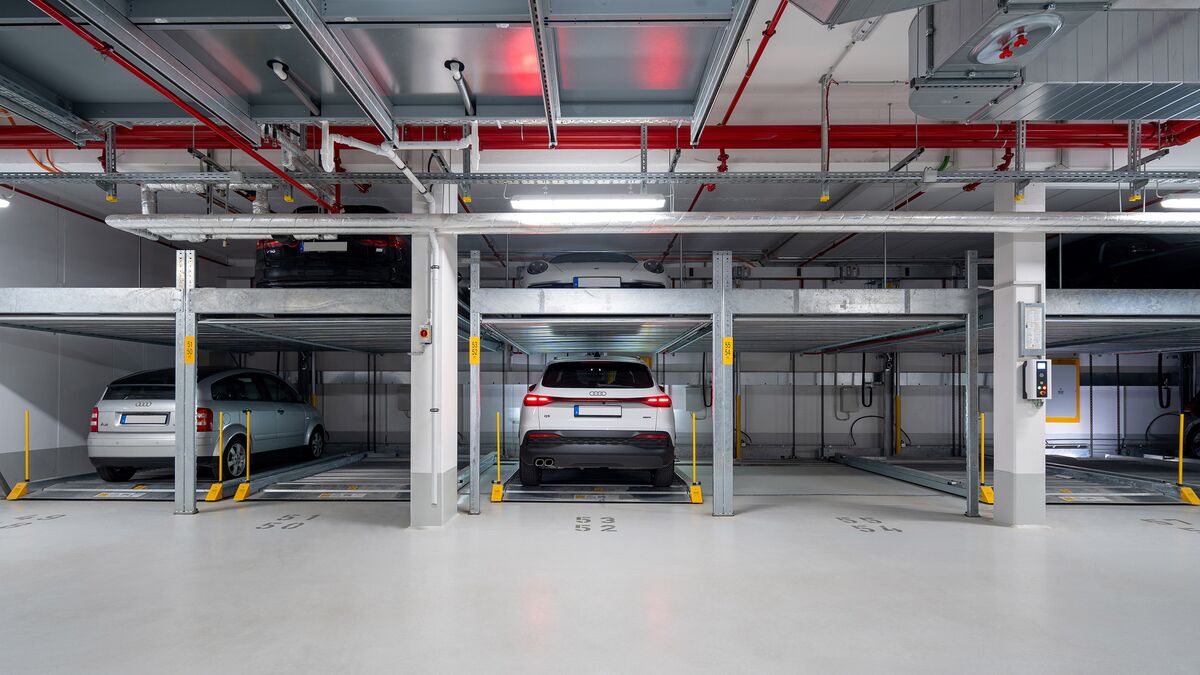 Front view of the parking system, showing a car parked in a parking space