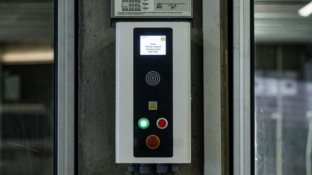 The image shows a control panel of a parking system.