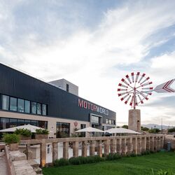 Exterior view of Motorworld Mallorca, showing part of the terrace