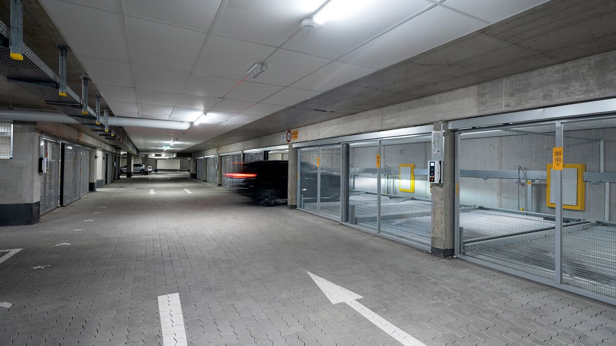 Overview of the underground car park with a car driving in